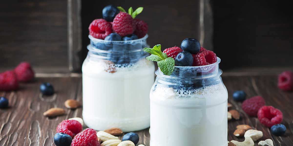 Live cultured or Greek yogurt is a happy food that's packed with probiotics or good bacteria